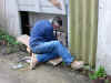 Trevor Corser wrestles with the kiln at the Leach pottery, St. Ives, Cornwall 3