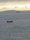 A lone fishing boat in St. Ives Bay, Cornwall